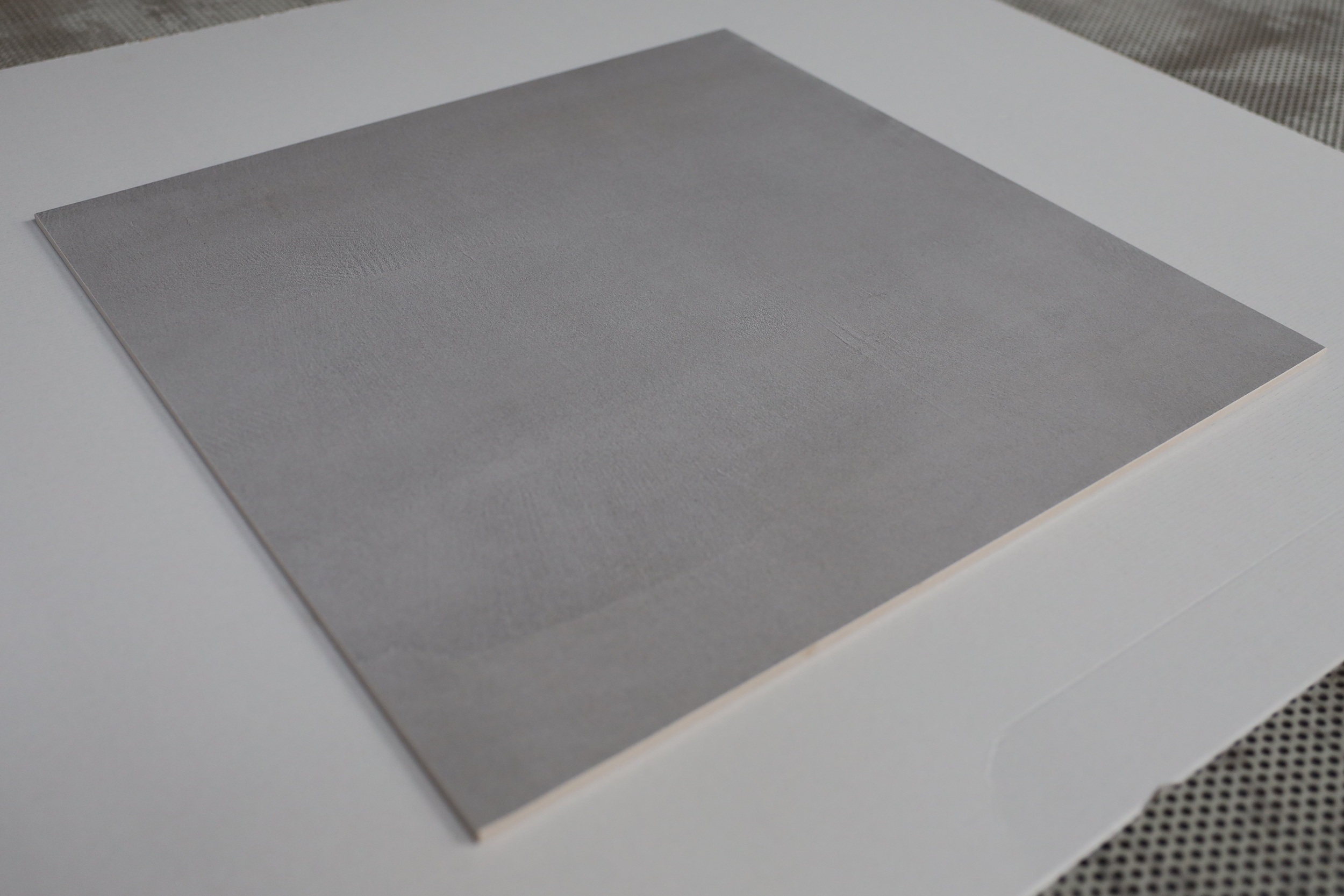 Плитка Monolit світло-сірий 600х600х7 Плитка Monolit світло-сірий 600х600х7